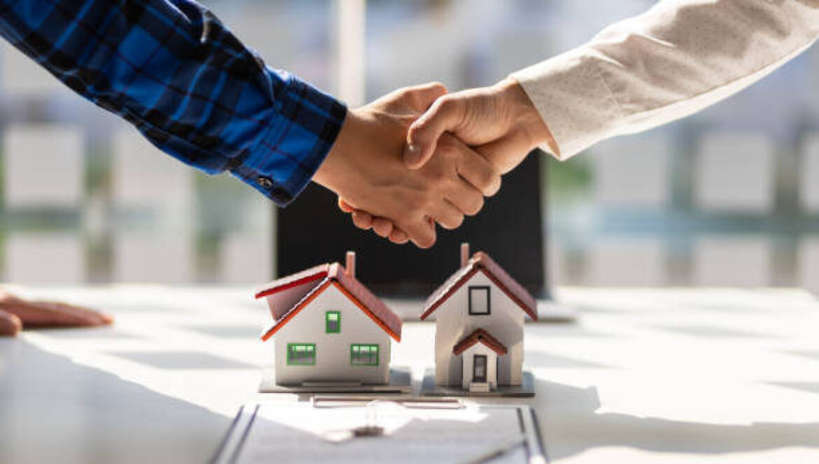 image represents a goal of shaking hands and forming a professional relationship with a realtor to sell a home